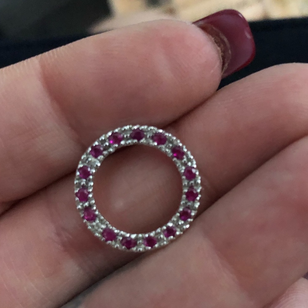 Ruby and diamond silver pendant